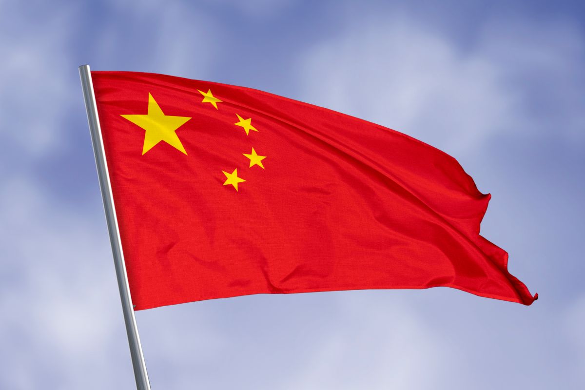 China,Flag,Isolated,On,Sky,Background.,Close,Up,Waving,Flag